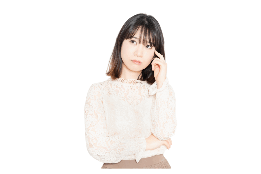 悩んでいる女性の画像